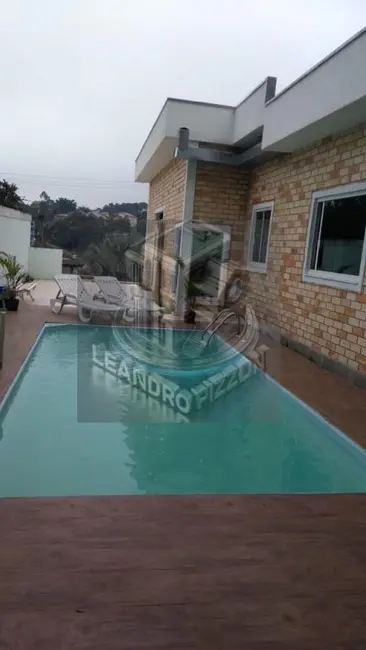 Foto 1 de Casa com 3 quartos à venda, 230m2 em Arujá Country Club, Itaquaquecetuba - SP