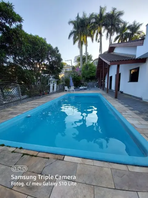 Foto 2 de Casa de Condomínio com 4 quartos à venda, 368m2 em Jardim das Cerejeiras, Aruja - SP