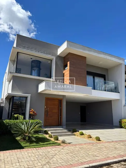 Foto 1 de Casa de Condomínio com 5 quartos à venda, 300m2 em Loteamento Belavilla I, Pouso Alegre - MG