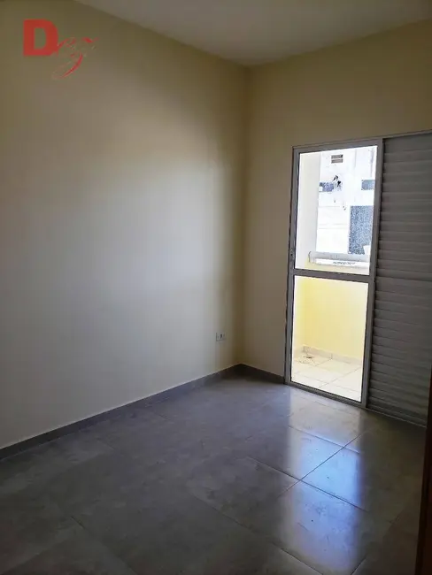Foto 1 de Casa de Condomínio com 2 quartos à venda, 51m2 em Princesa, Praia Grande - SP