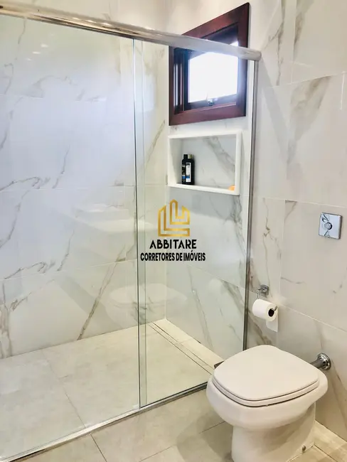 Foto 6 de Casa com 4 quartos à venda, 301m2 em Torres - RS