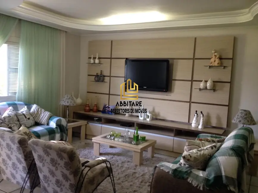 Casa com 3 quartos à venda, 250m2 em Torres - RS - imagem 3 Foto 3 de Casa com 3 quartos à venda, 250m2 em Torres - RS