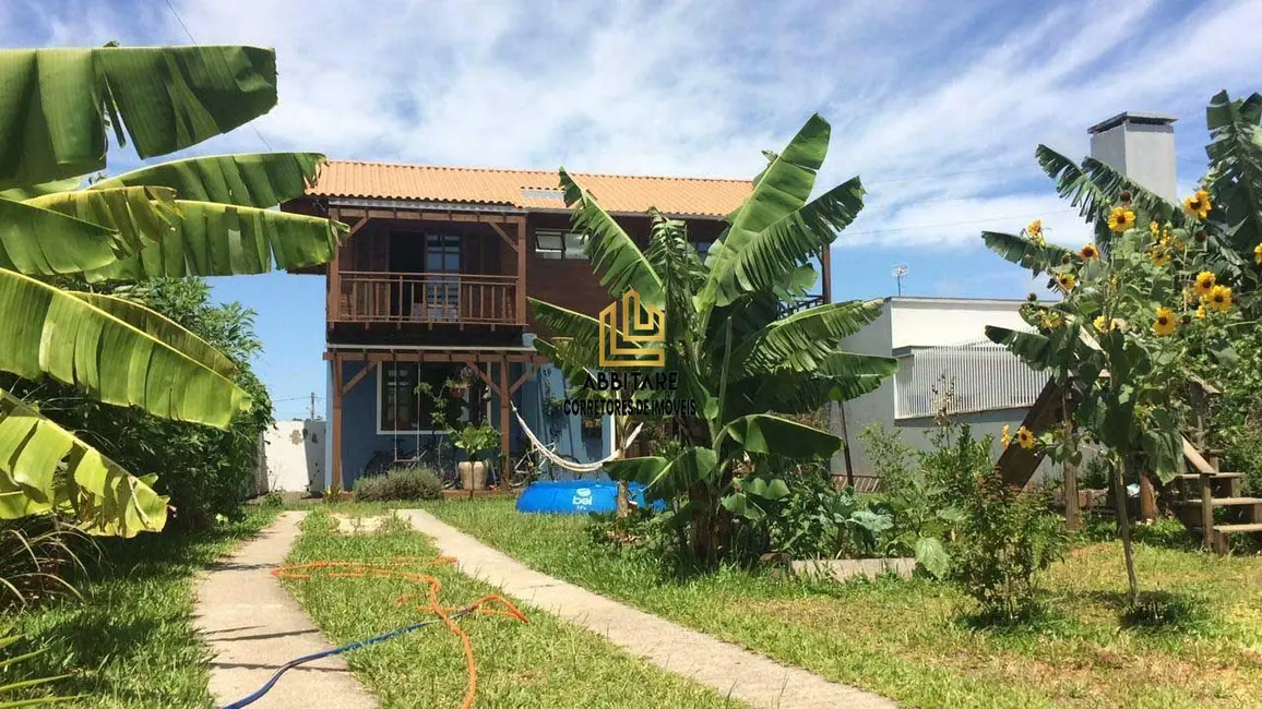Foto 2 de Casa com 3 quartos à venda, 114m2 em Torres - RS