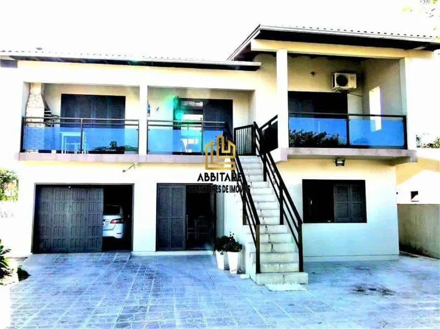 Foto 2 de Casa com 4 quartos à venda, 220m2 em Torres - RS