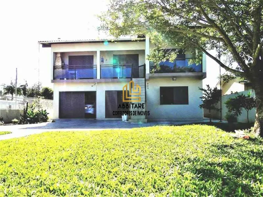 Foto 1 de Casa com 4 quartos à venda, 220m2 em Torres - RS