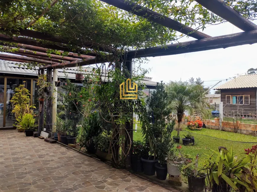 Foto 2 de Casa com 2 quartos à venda, 110m2 em Torres - RS