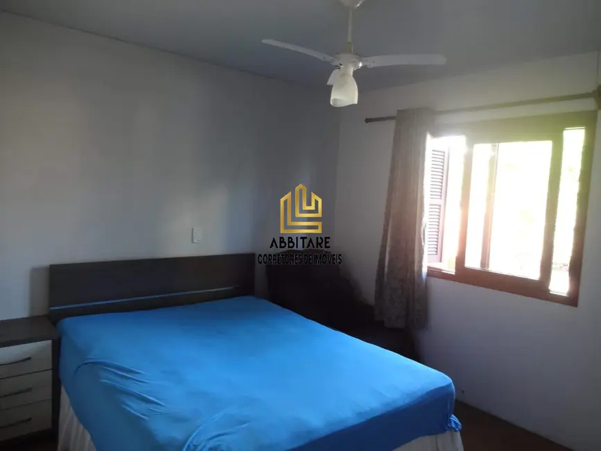 Casa com 4 quartos à venda, 150m2 em Torres - RS - imagem 8 Foto 8 de Casa com 4 quartos à venda, 150m2 em Torres - RS