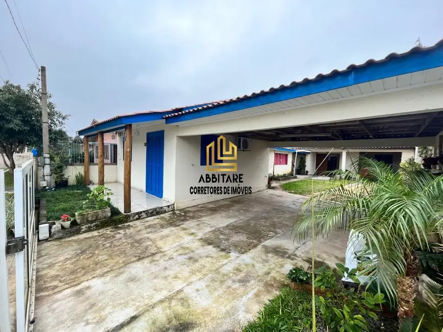 Foto 1 de Casa com 3 quartos à venda, 115m2 em Torres - RS