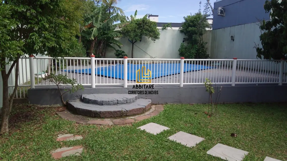 Casa com 3 quartos à venda, 200m2 em Torres - RS - imagem 1 Foto 1 de Casa com 3 quartos à venda, 200m2 em Torres - RS