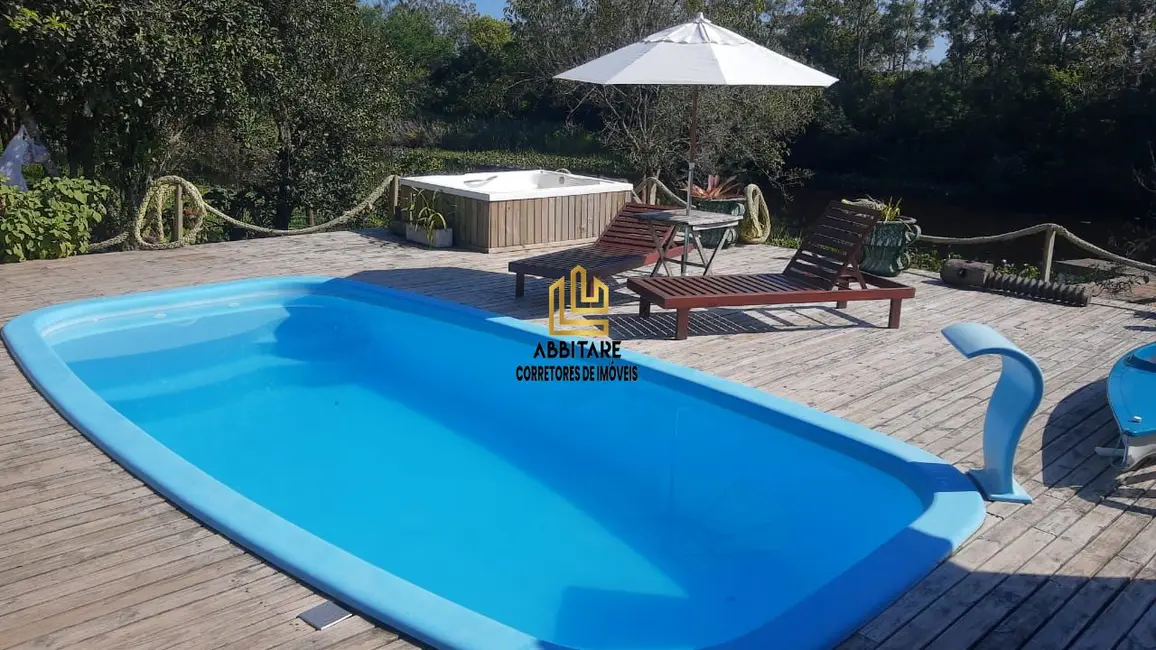 Foto 1 de Chácara com 3 quartos à venda, 120m2 em Torres - RS
