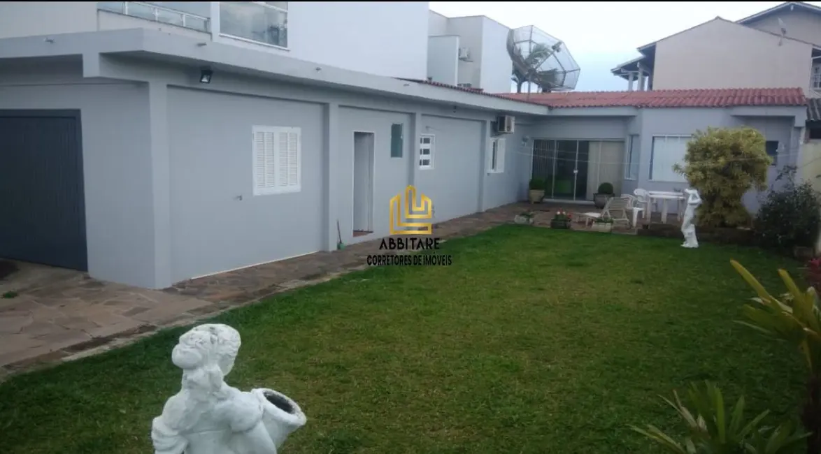 Foto 3 de Casa com 3 quartos à venda, 160m2 em Torres - RS