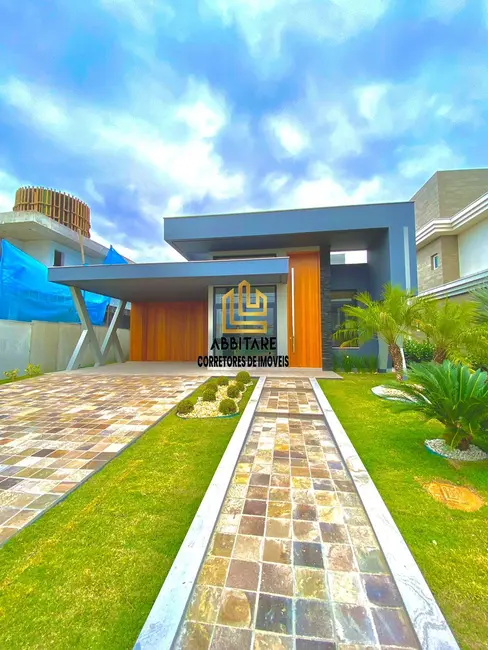 Foto 1 de Casa de Condomínio com 3 quartos à venda, 240m2 em Torres - RS