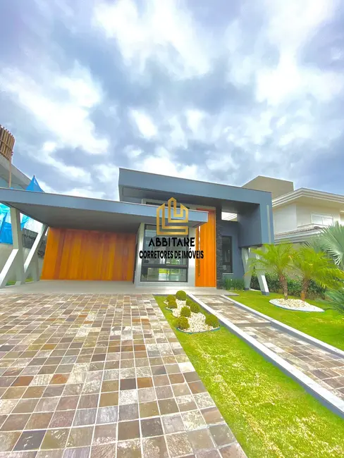 Foto 2 de Casa de Condomínio com 3 quartos à venda, 240m2 em Torres - RS