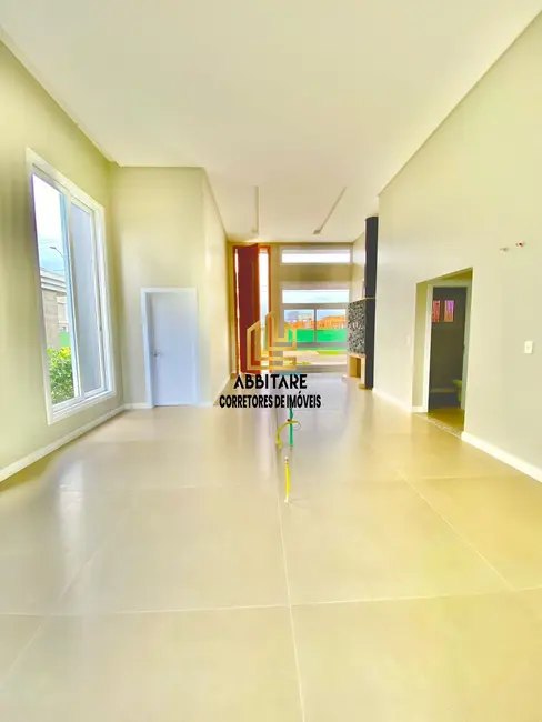 Foto 9 de Casa de Condomínio com 3 quartos à venda, 240m2 em Torres - RS