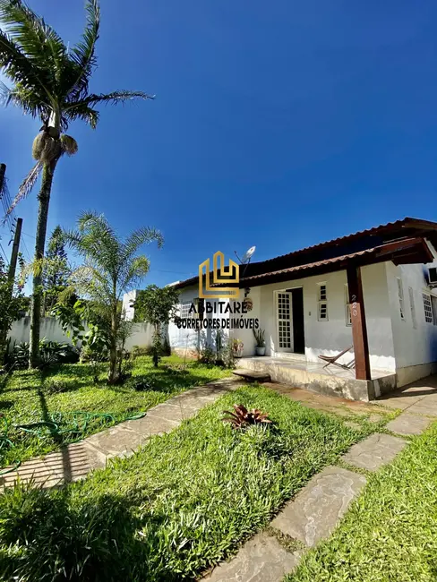 Foto 1 de Casa com 3 quartos à venda, 96m2 em Torres - RS