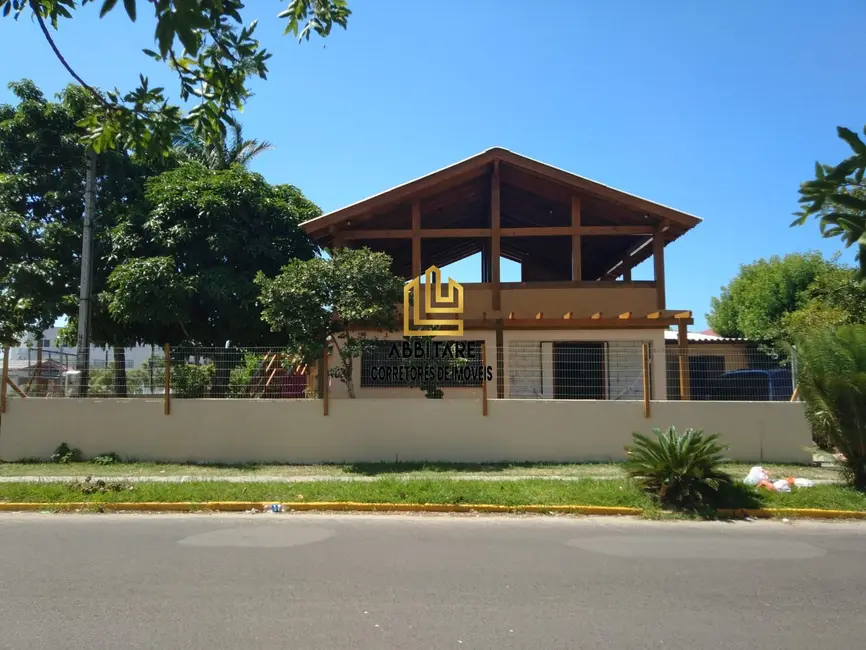 Foto 1 de Casa com 3 quartos à venda, 92m2 em Torres - RS