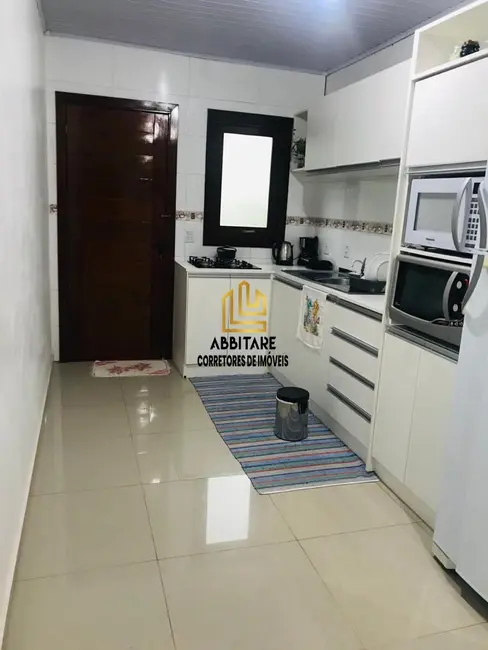 Foto 3 de Casa com 2 quartos à venda, 100m2 em Torres - RS