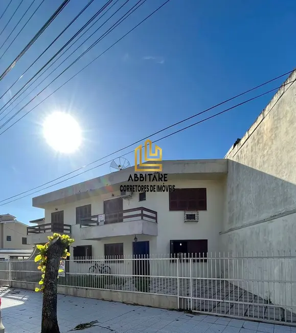 Foto 1 de Casa com 6 quartos à venda, 219m2 em Centro, Torres - RS