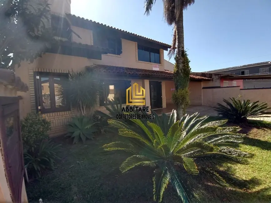 Foto 2 de Casa com 6 quartos à venda, 250m2 em Torres - RS