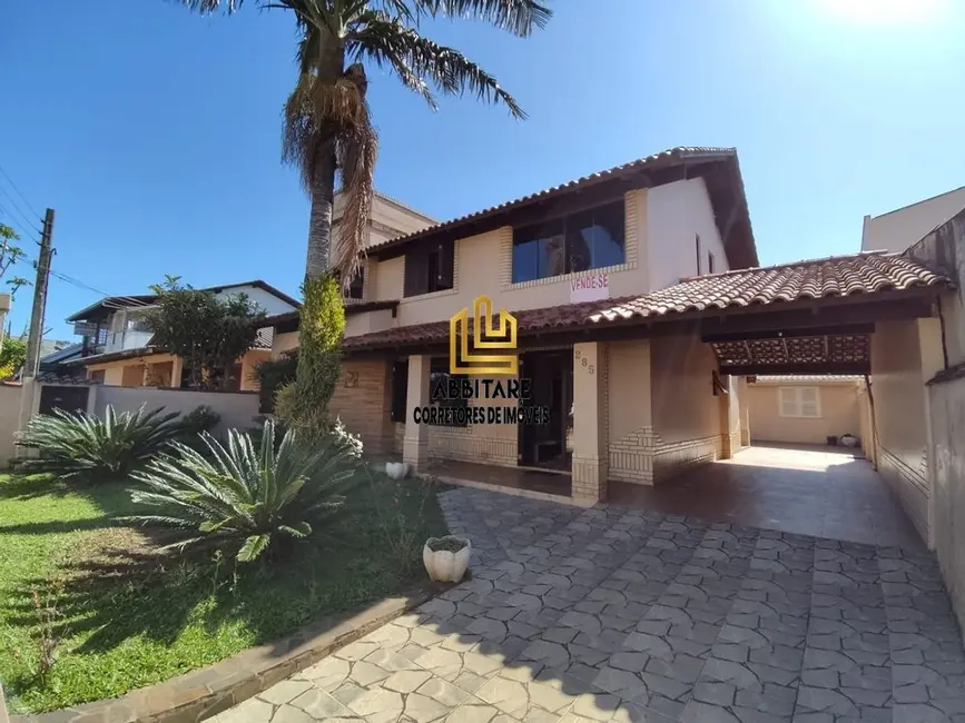 Foto 1 de Casa com 6 quartos à venda, 250m2 em Torres - RS