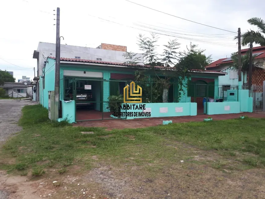 Foto 1 de Casa com 5 quartos à venda, 169m2 em Torres - RS