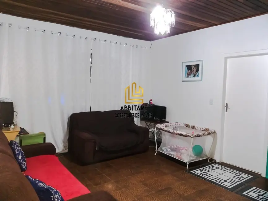 Foto 2 de Casa com 5 quartos à venda, 169m2 em Torres - RS