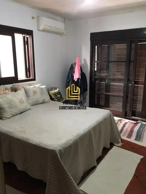 Casa com 3 quartos à venda, 135m2 em Torres - RS - imagem 8 Foto 8 de Casa com 3 quartos à venda, 135m2 em Torres - RS