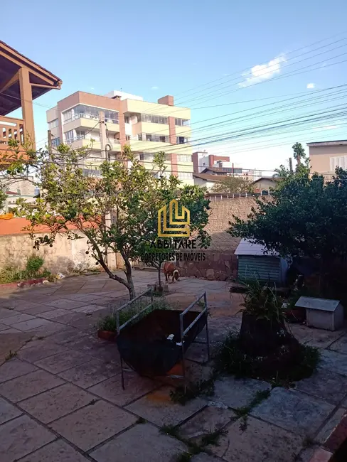 Casa com 6 quartos à venda, 129m2 em Centro, Torres - RS - imagem 7 Foto 7 de Casa com 6 quartos à venda, 129m2 em Centro, Torres - RS