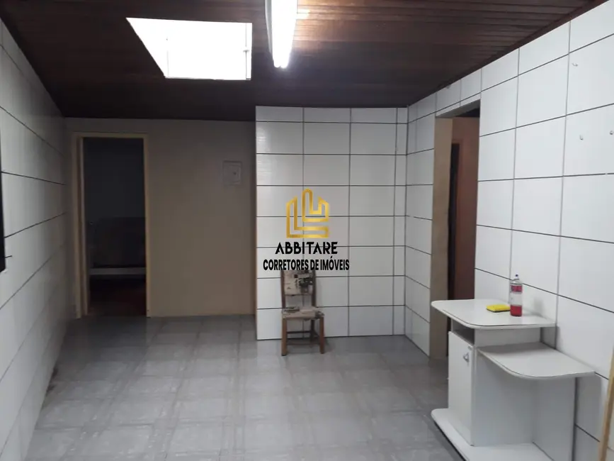 Casa com 6 quartos à venda, 129m2 em Centro, Torres - RS - imagem 6 Foto 6 de Casa com 6 quartos à venda, 129m2 em Centro, Torres - RS
