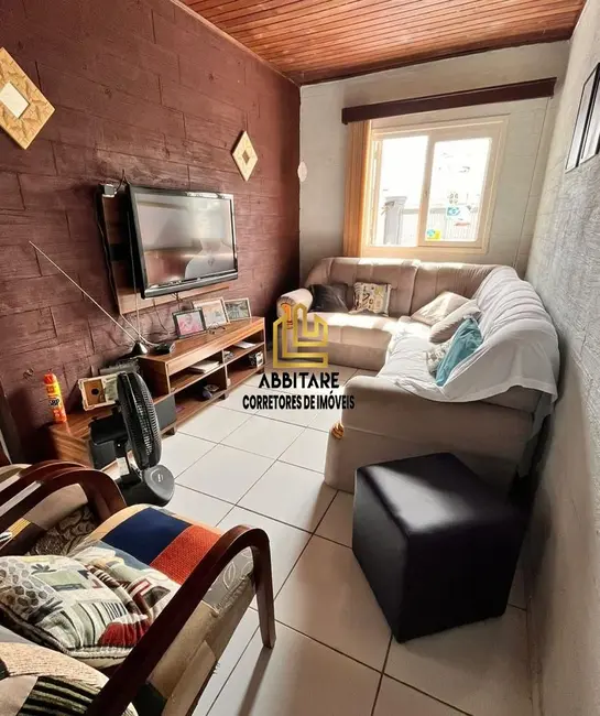 Casa com 3 quartos à venda, 85m2 em Torres - RS - imagem 1 Foto 1 de Casa com 3 quartos à venda, 85m2 em Torres - RS