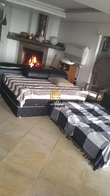 Casa com 4 quartos à venda, 310m2 em Torres - RS - imagem 4 Foto 4 de Casa com 4 quartos à venda, 310m2 em Torres - RS