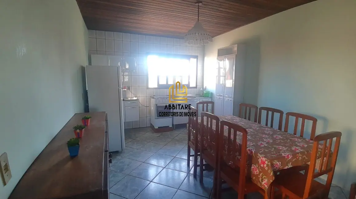Foto 1 de Casa com 6 quartos à venda, 100m2 em Torres - RS