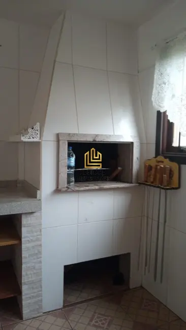 Casa com 4 quartos à venda, 219m2 em Torres - RS - imagem 2 Foto 2 de Casa com 4 quartos à venda, 219m2 em Torres - RS