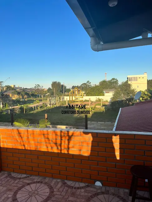 Casa com 3 quartos à venda, 72m2 em Torres - RS - imagem 1 Foto 1 de Casa com 3 quartos à venda, 72m2 em Torres - RS
