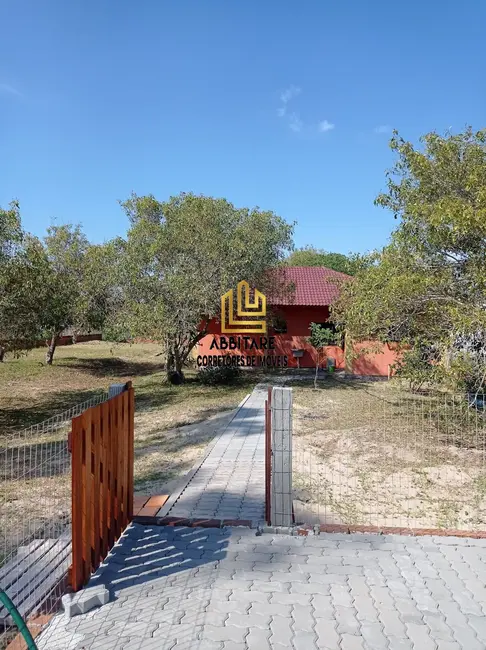 Foto 1 de Casa com 3 quartos à venda, 115m2 em Torres - RS