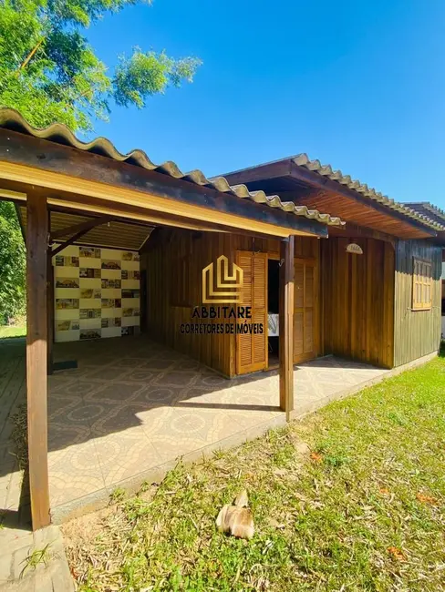 Foto 2 de Casa com 3 quartos à venda, 88m2 em Torres - RS