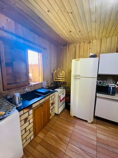 Foto 6 de Casa com 3 quartos à venda, 88m2 em Torres - RS