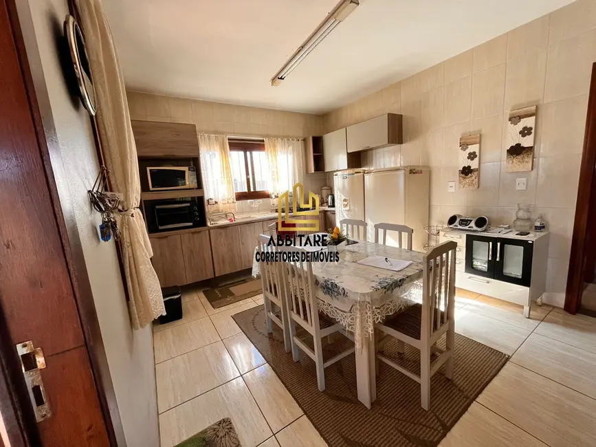 Casa com 4 quartos à venda, 85m2 em Torres - RS - imagem 4 Foto 4 de Casa com 4 quartos à venda, 85m2 em Torres - RS