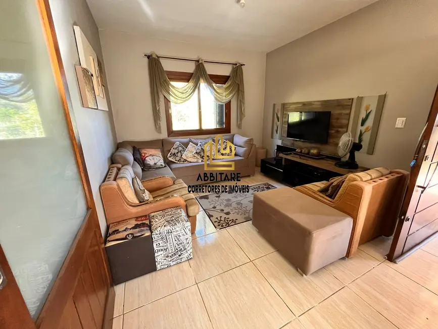 Casa com 4 quartos à venda, 85m2 em Torres - RS - imagem 2 Foto 2 de Casa com 4 quartos à venda, 85m2 em Torres - RS