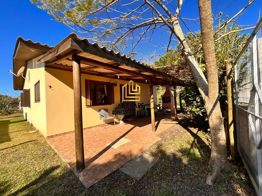 Casa com 4 quartos à venda, 85m2 em Torres - RS - imagem 1 Foto 1 de Casa com 4 quartos à venda, 85m2 em Torres - RS