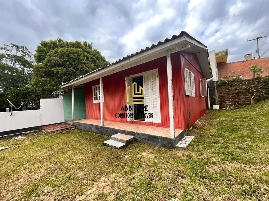 Foto 1 de Casa com 2 quartos à venda, 56m2 em Torres - RS