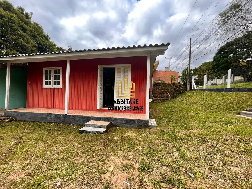 Foto 2 de Casa com 2 quartos à venda, 56m2 em Torres - RS