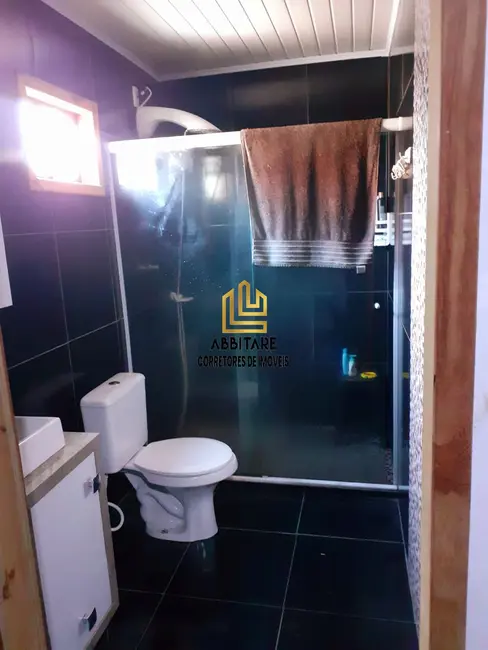 Casa com 4 quartos à venda, 200m2 em Torres - RS - imagem 3 Foto 3 de Casa com 4 quartos à venda, 200m2 em Torres - RS