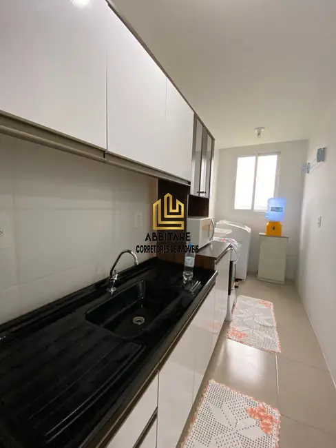 Foto 4 de Apartamento com 2 quartos à venda, 58m2 em Torres - RS