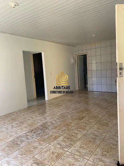 Foto 2 de Casa com 2 quartos à venda, 149m2 em Torres - RS