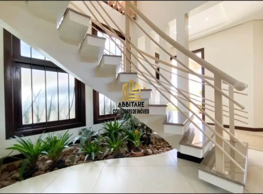 Casa com 3 quartos à venda, 254m2 em Centro, Torres - RS - imagem 8 Foto 8 de Casa com 3 quartos à venda, 254m2 em Centro, Torres - RS