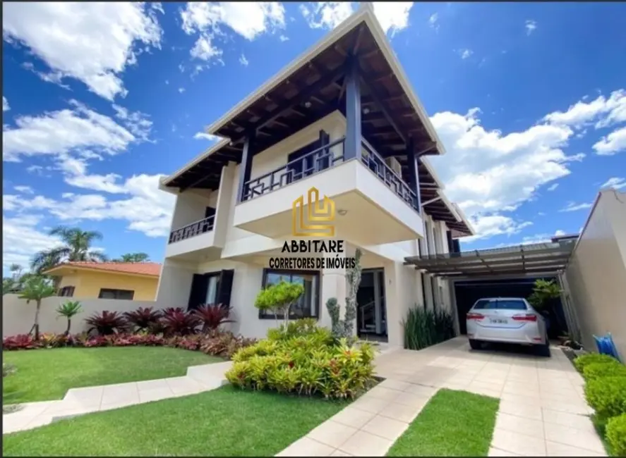 Foto 1 de Casa com 3 quartos à venda, 254m2 em Centro, Torres - RS