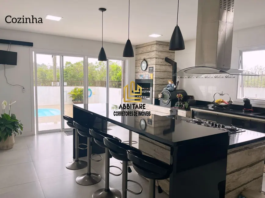 Foto 3 de Casa com 4 quartos à venda, 185m2 em Torres - RS