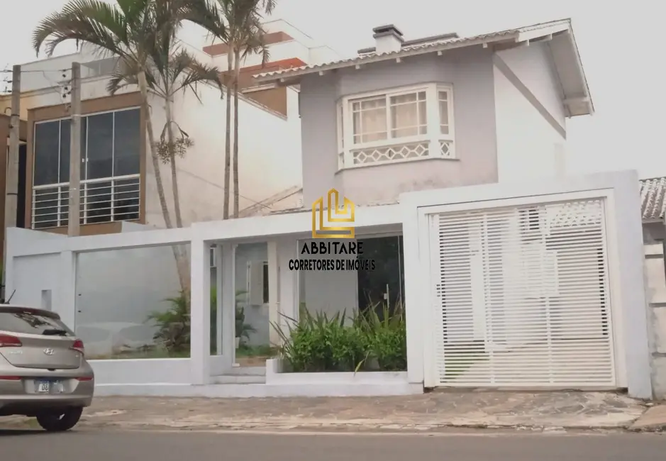 Foto 1 de Casa com 3 quartos à venda, 170m2 em Torres - RS