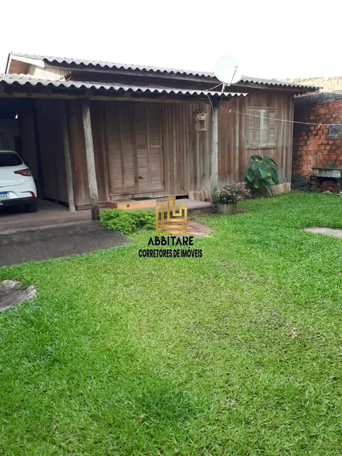 Casa com 4 quartos à venda, 101m2 em Torres - RS - imagem 4 Foto 4 de Casa com 4 quartos à venda, 101m2 em Torres - RS